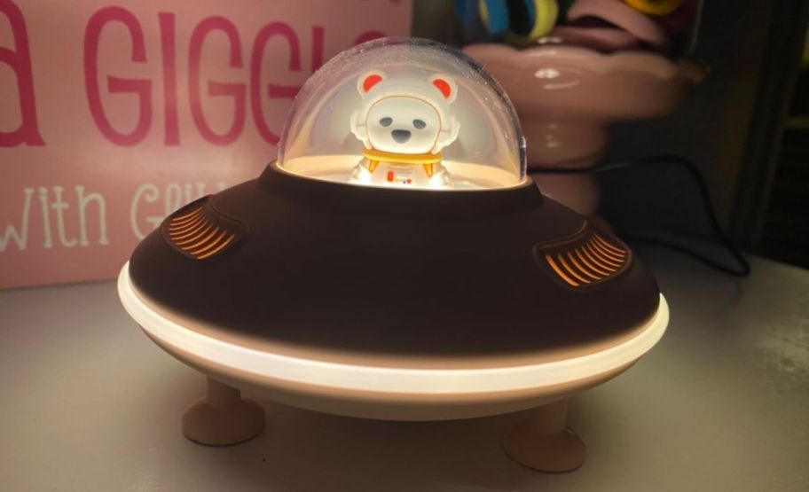 a spaceship bluetooth speaker with night light