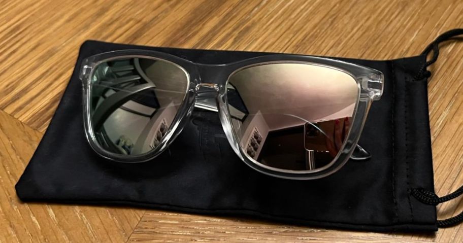 A pair of. Danamy Women's Polarized Sunglasses on a soft case