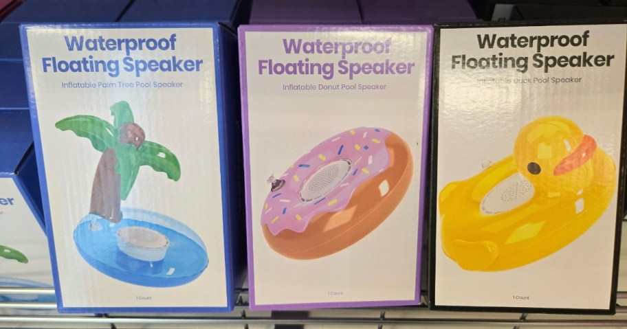 3 boxes of floating waterproof speakers on a store shelf