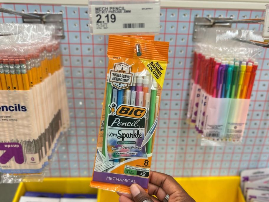 hand touching a pack of bic mechanical pencils at Targer