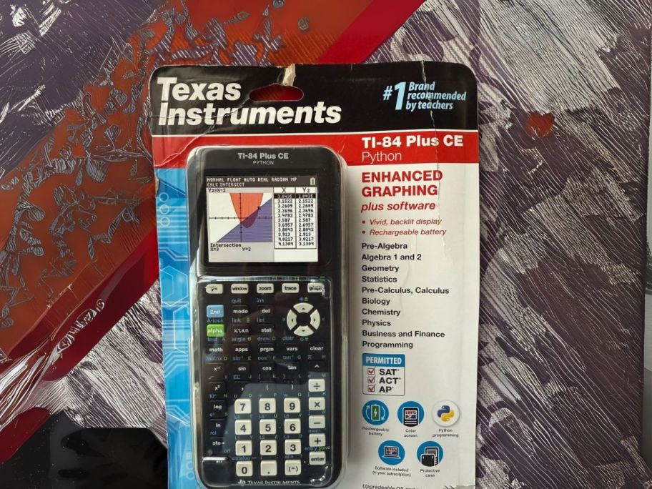 Texas Instruments TI-84 Plus CE Python Graphing Calculator package on table
