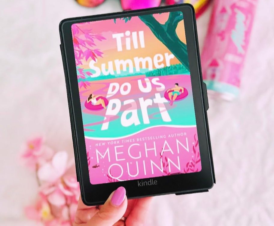 hand holding kindle with till summer do us part