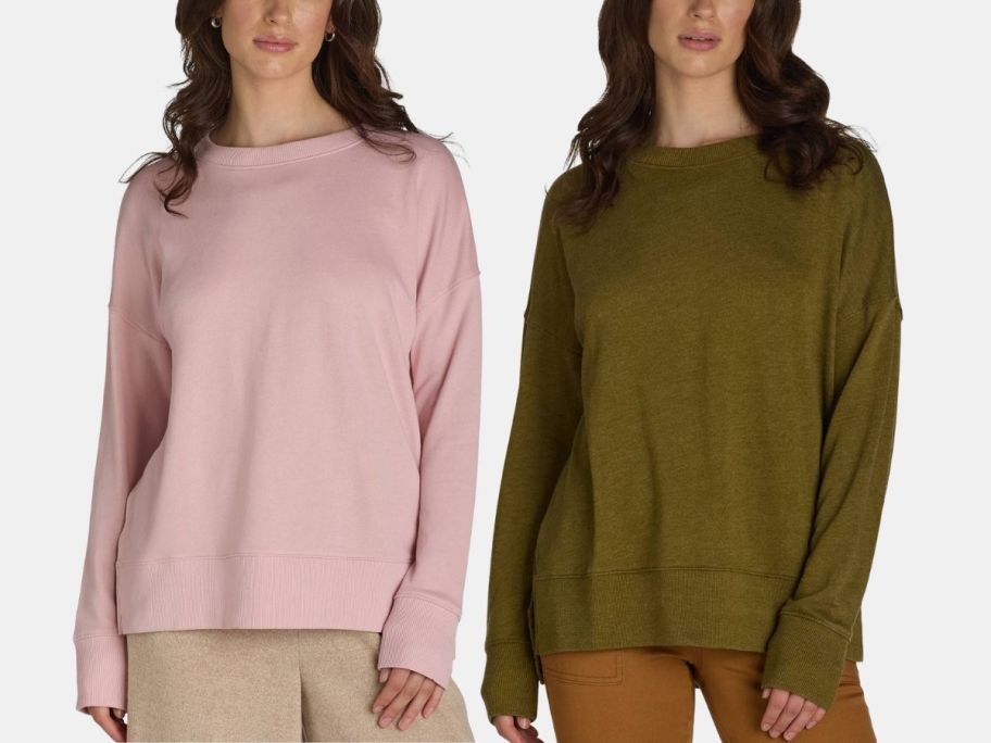 two women in crew neck sweatshirts