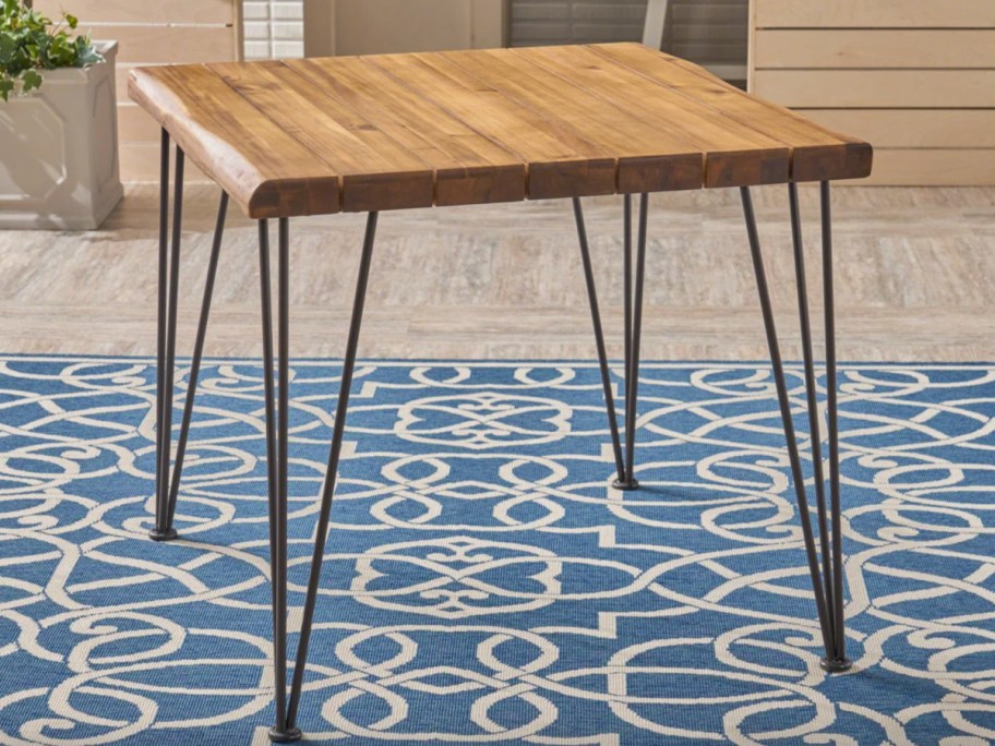 wood top and black hairpin legs table
