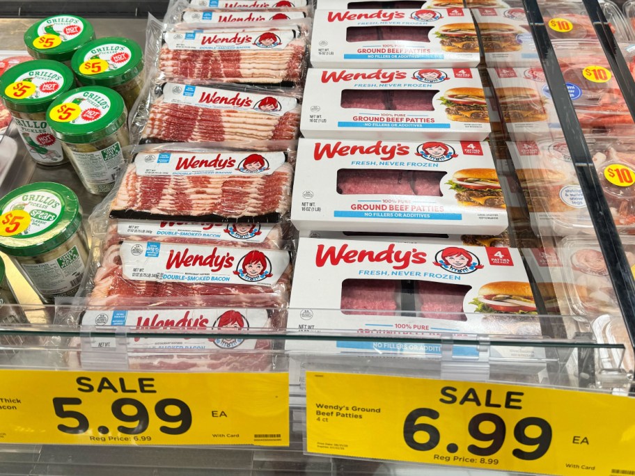 Wendy's bacon and burger patties in refrigerated meat case