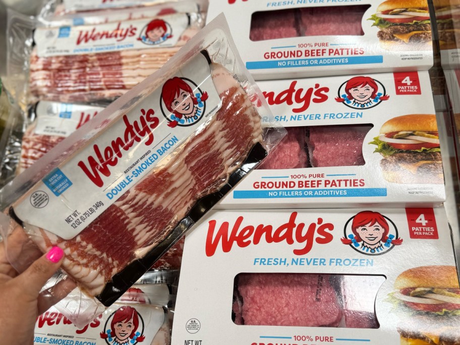Wendy's bacon and burger patties in refrigerated meat case at grocery store