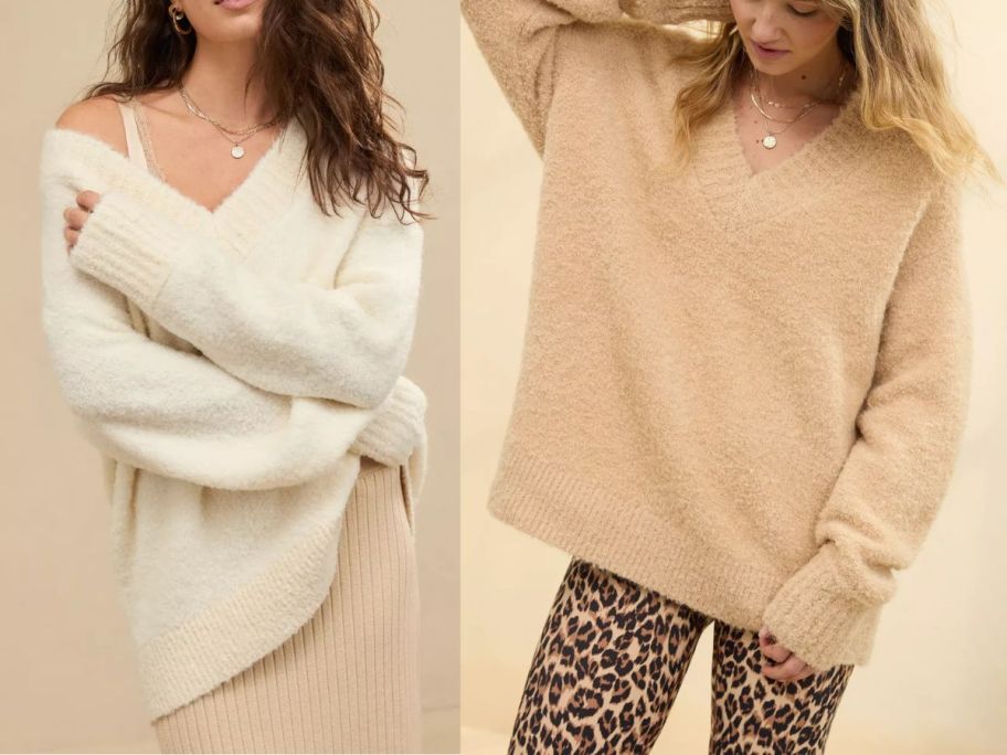 2 women wearing oversized sweaters