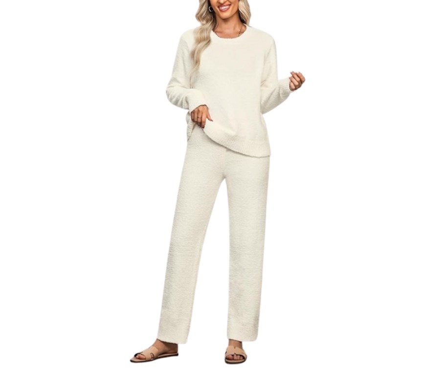 stock photo of woman wearing cozy white pajamas