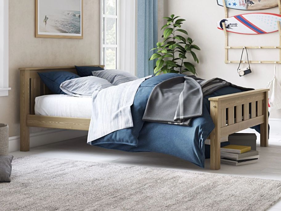 A Better Homes & Gardens Kane Wooden Full-Size Platform Bed in natural wood