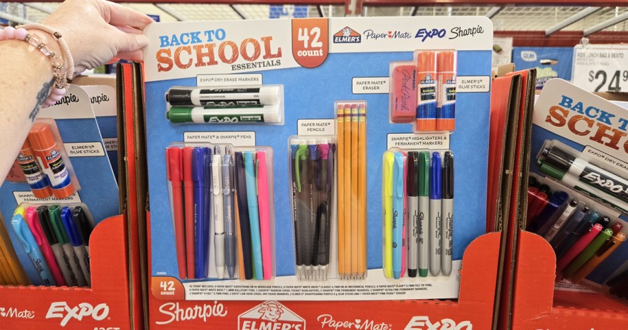 hand holding a back to school essentials kit