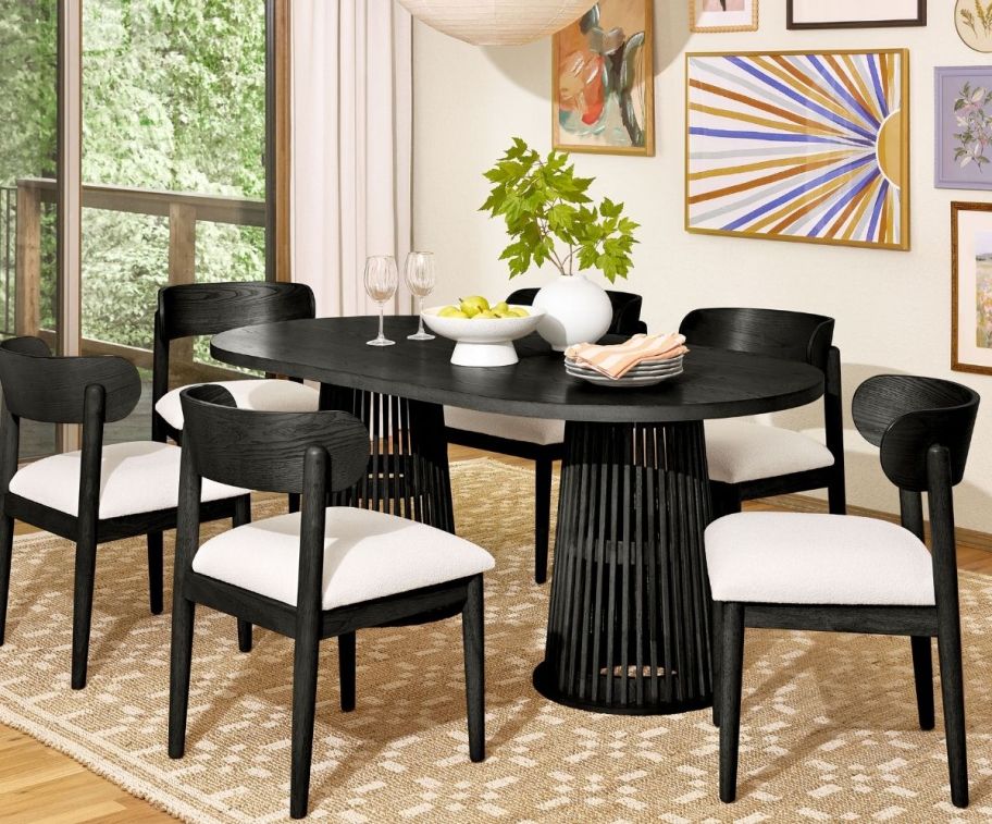 a black oval dining table