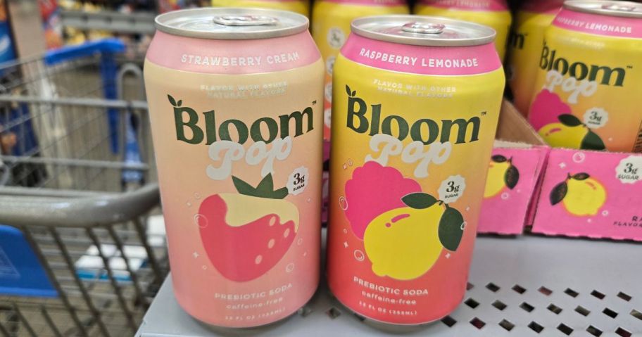 2 cans of Bloom Pop Prebiotic Soda on a Walmart Shelf