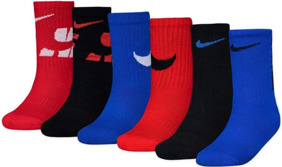 six pair of kids crew socks in red black and blue designs