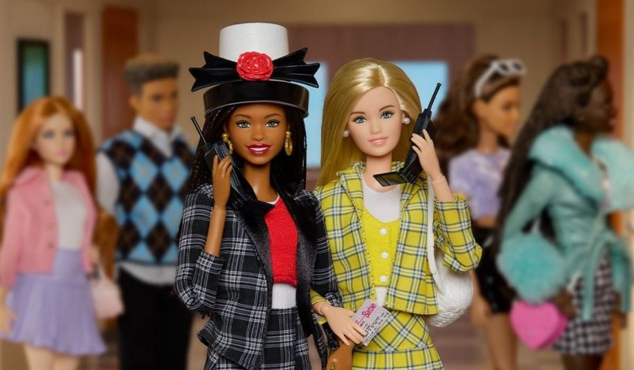 dionne and chwer barbie dolls on their tiny cell phones