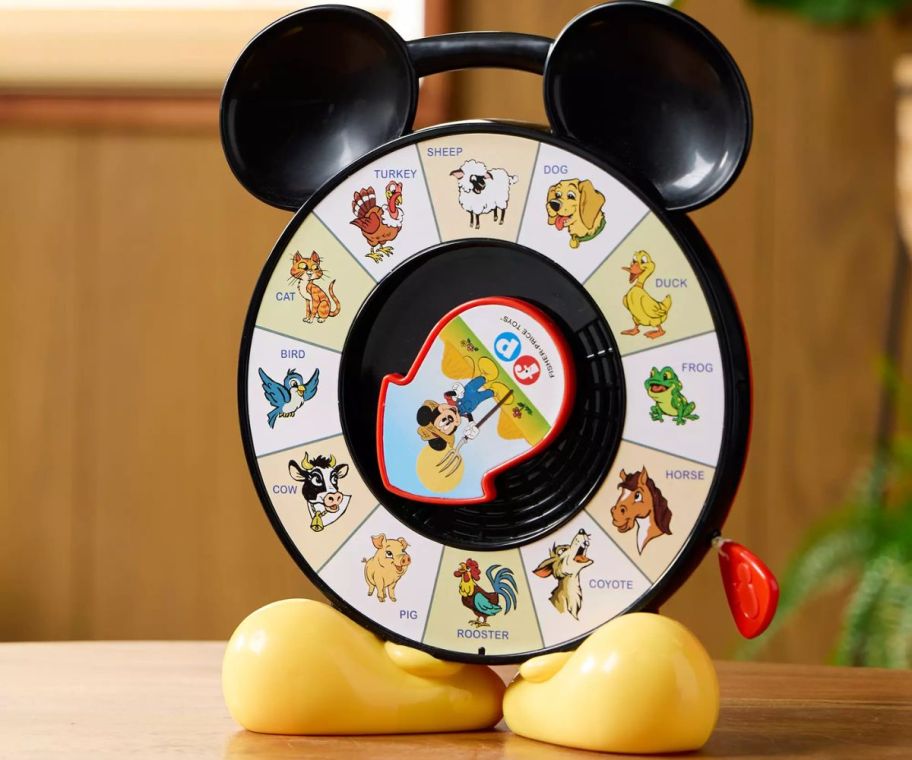 A see n say toy with Mickey Mouse on it