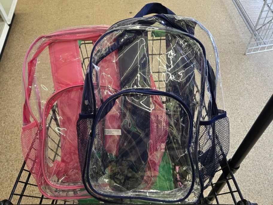 Two Clear Backpacks in a dollar tree shopping cart