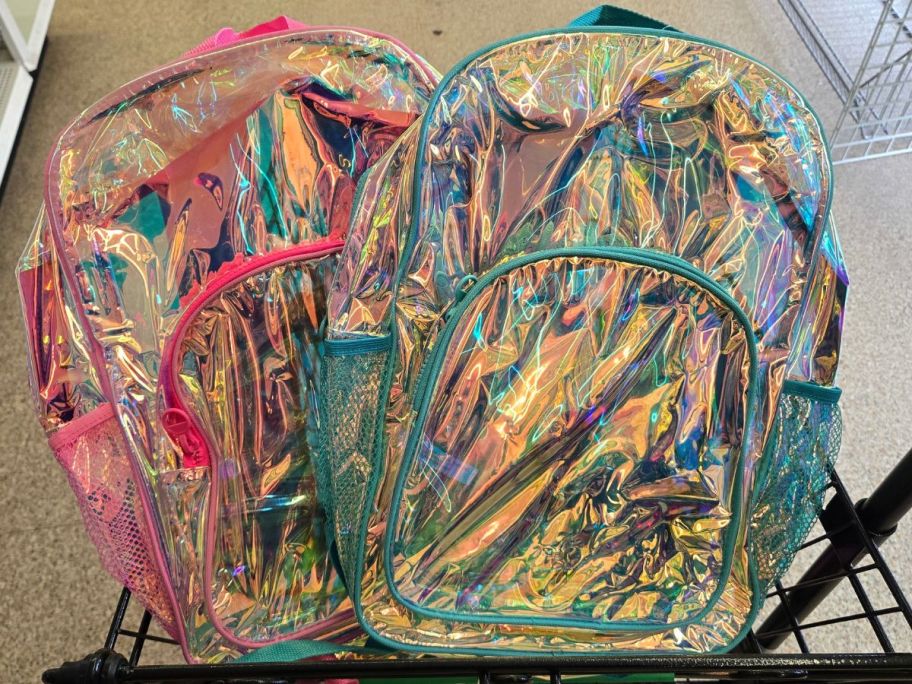 Two iridescent clear backpacks at Dollar Tree