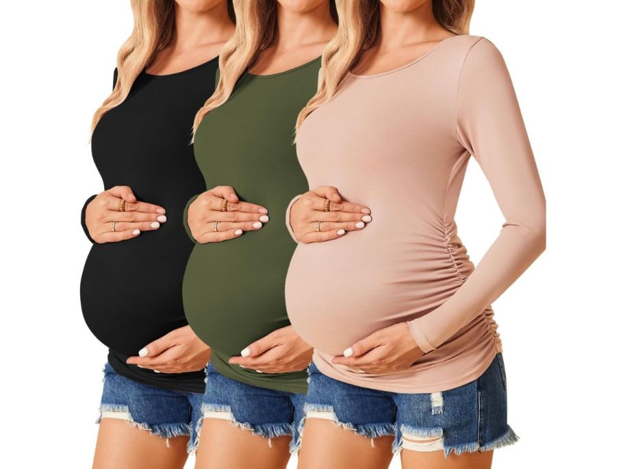 3 pregnant women wearing long sleeved t shirts