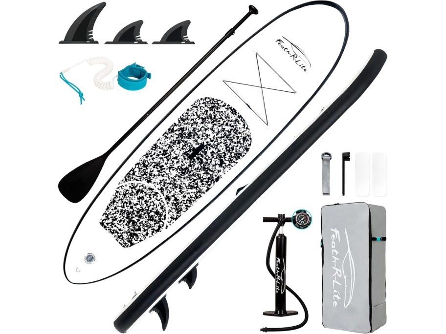 black and white paddle board with accessories