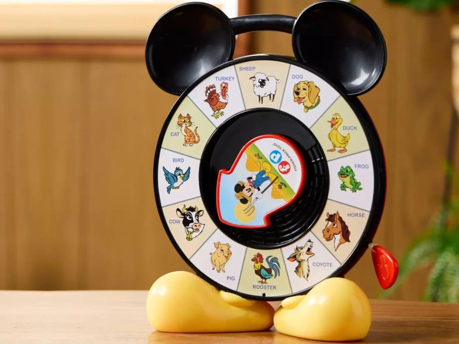 A Fisher Price Mickey Mouse & Friends SEE 'N SAY on a table