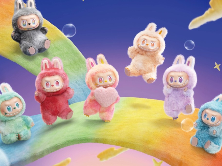 Labubu dolls with a rainbow background