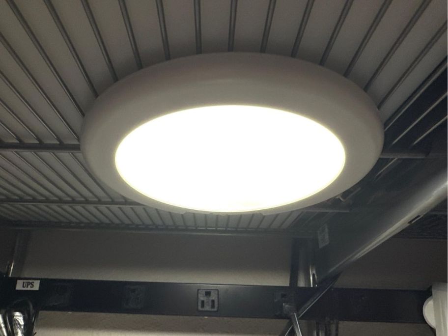 a round magnetic Wireless Ceiling Light on a ceiling
