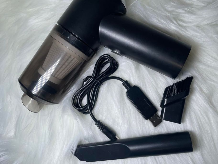 A mini handheld portable vacuum