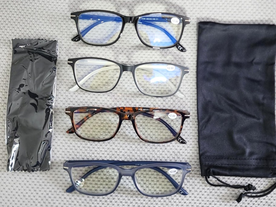 4 pairs of reading glasses in a row