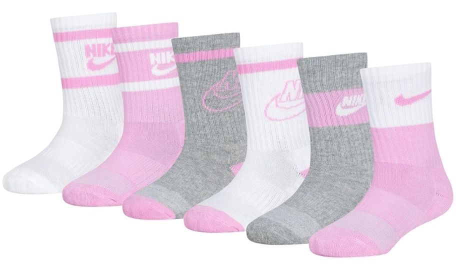 six pair of kids crew socks in pink gray and white designs