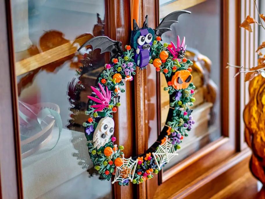 LEGO Halloween Wreath with bats and ghosts on a cabinet