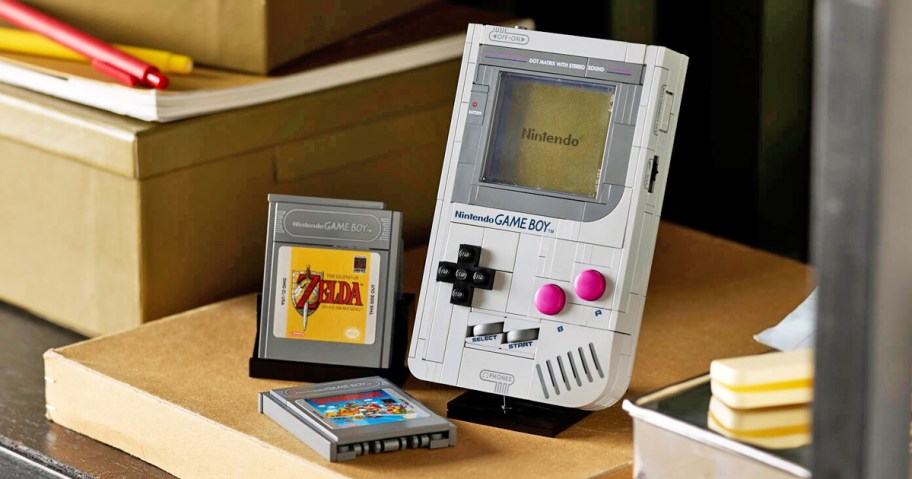 grey LEGO Nintendo Game Boy with game cartridges