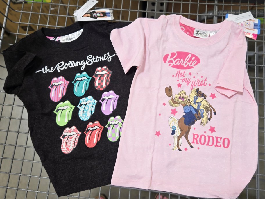 rolling stones and rodeo barbie shirts in shopping cart