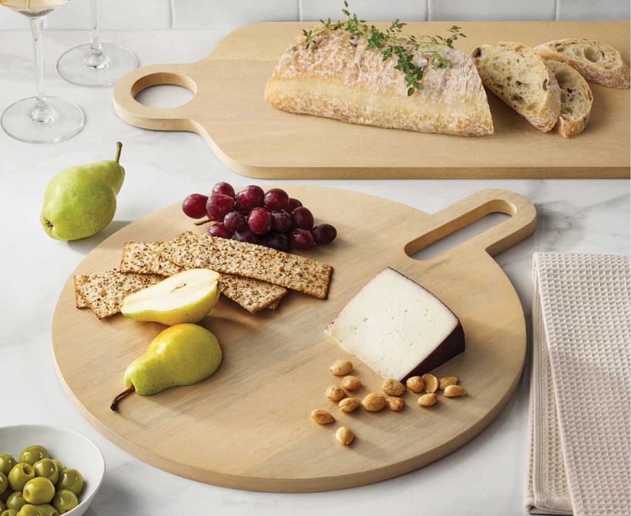 two wooden charcuterie trays