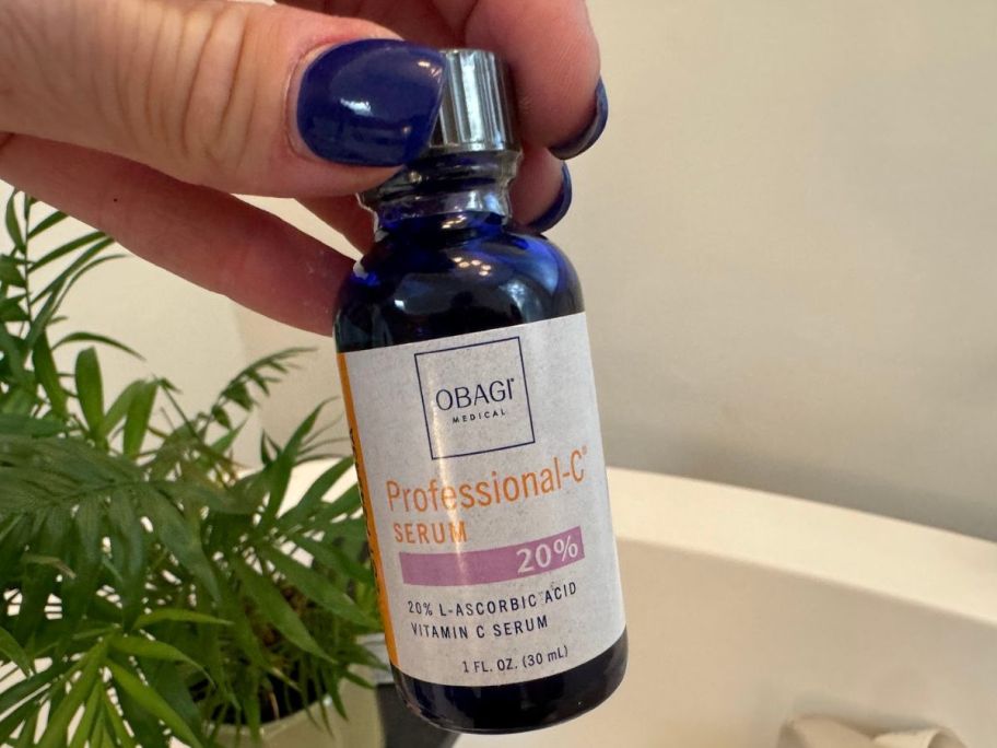 hand holding Obagi Professional-C Vitamin C Serum