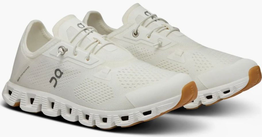 A pair of off white sneakers