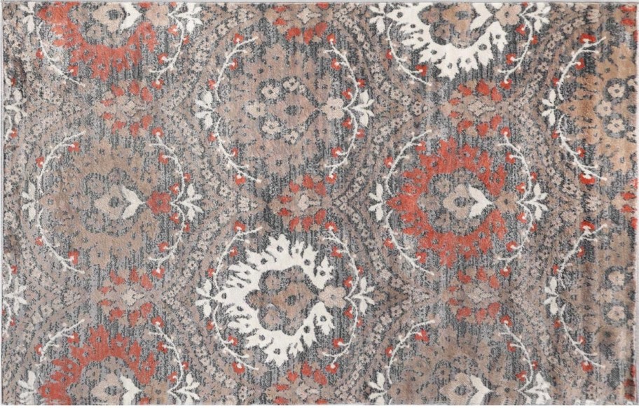 a rut and brown floral damask print rug