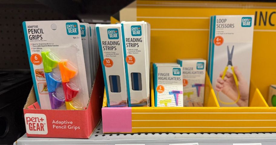 White boxes of textured stickers in a store display