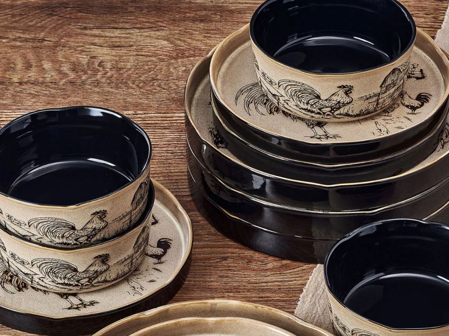 display of Pfaltzgraff chicken plates on top of the table 