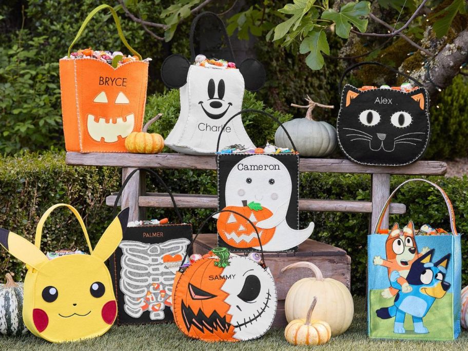 Several different pottery Barn Halloween Bags