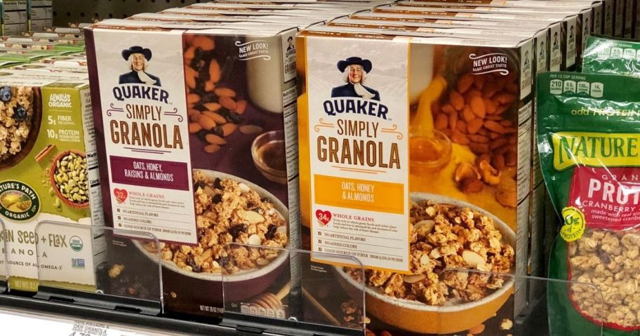 boxes of Quaker Simply Granola on a store shelf