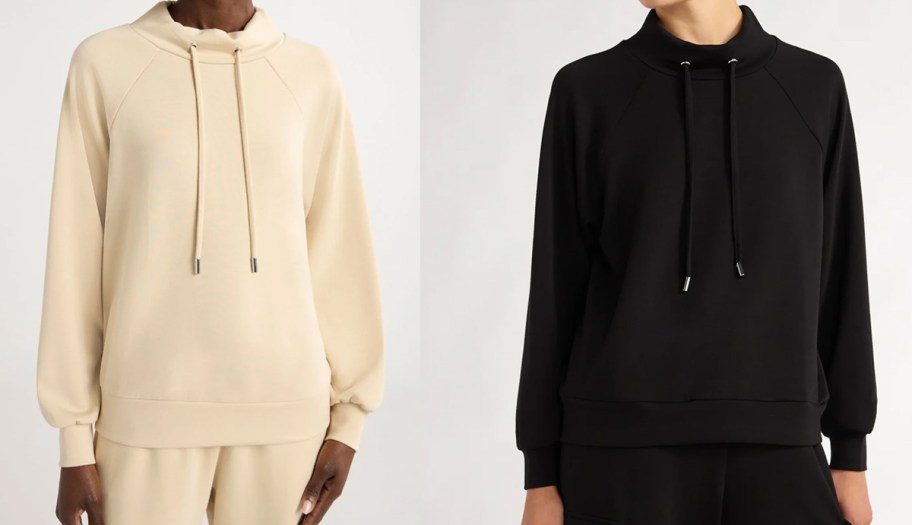 two women in tan and black funnel neck sweatshirts