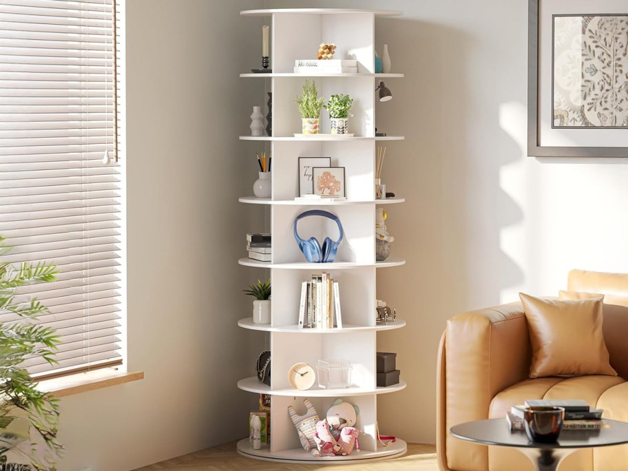 SpaceAid 7-Tier Rotating Shoe Rack holding books, supplies, headphones and other small items