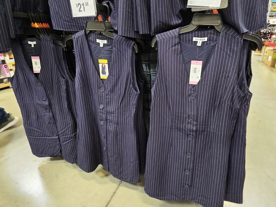 navy blue and white pinstripe dresses on store display