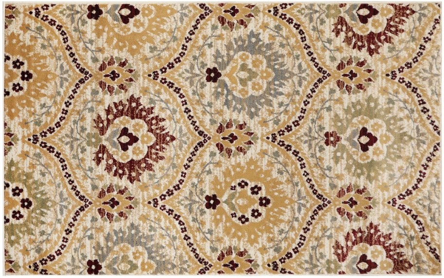 a tan oriental patterned rug