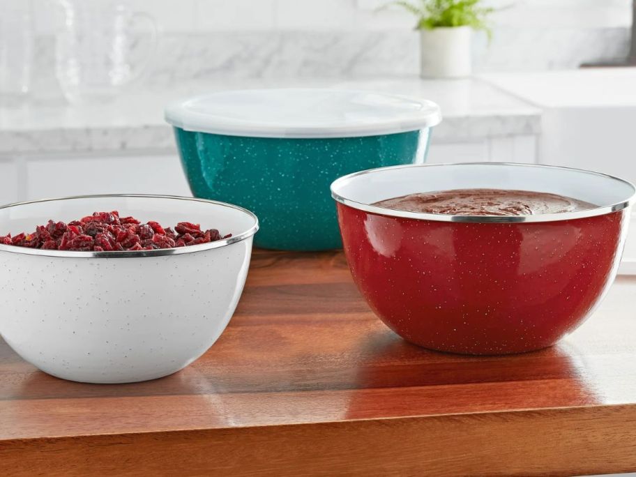 A set of red white and blue Pioneer Woman mixing bowls