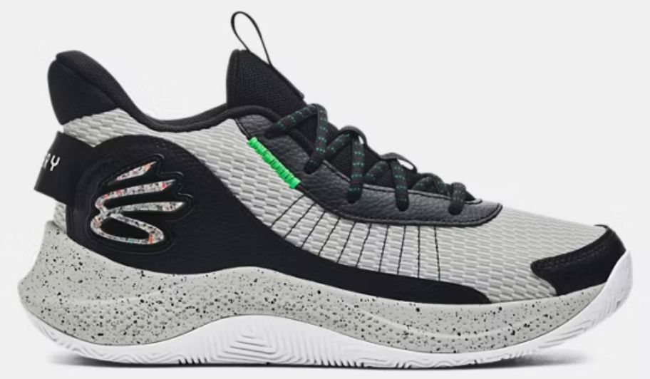 An Under Armour Curry basketball shoe in gray and black