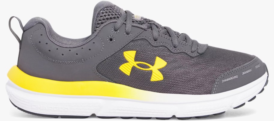 grey and yellow under armour running shoe