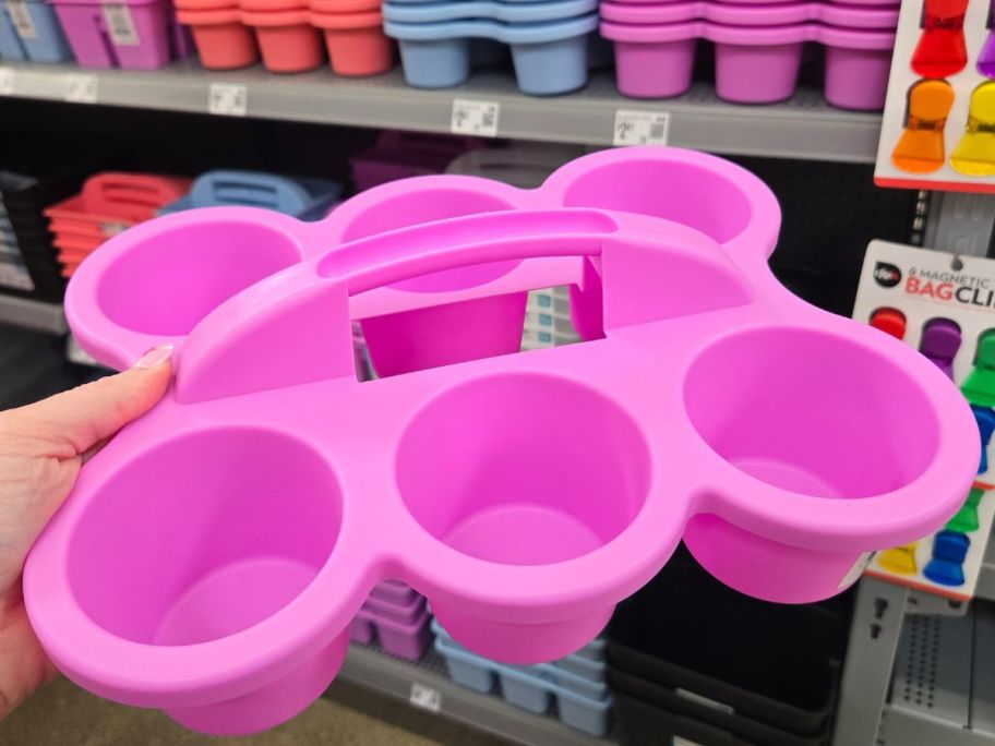 Hans holding a violet Pen+Gear Plastic Cup Caddy 