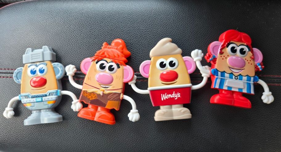four different kinds of wendy mr and mrs potatoo toys 