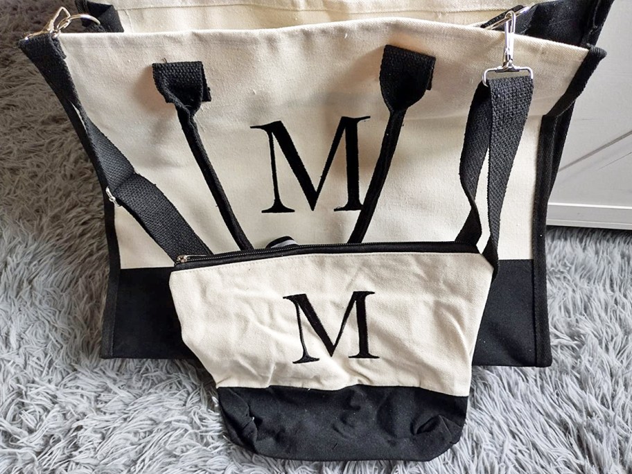 matching tote and makeup bag with the letter M embroidered on them